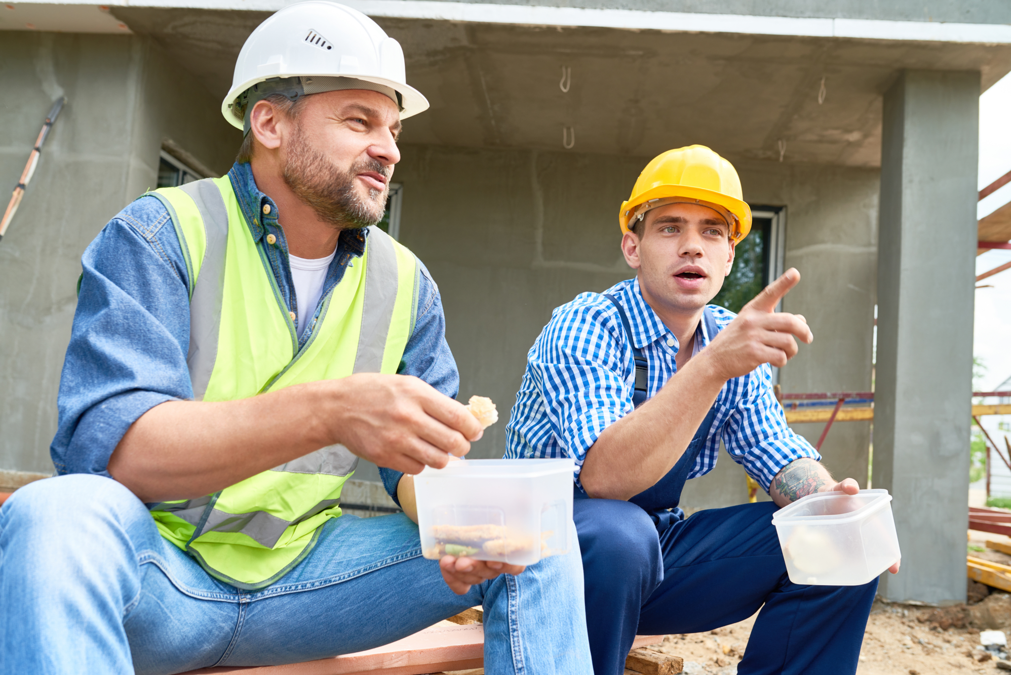 Portrait,Of,Two,Construction,Workers,Taking,Break,On,Site,Eating